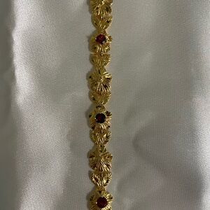 Gold Bracelet with Red Accents